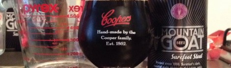 A Measuring Jug, Tulip Glass and Can of Mountain Goat Surefoot Stout