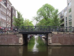 A Bridge Over A Canal In Amsterdam
