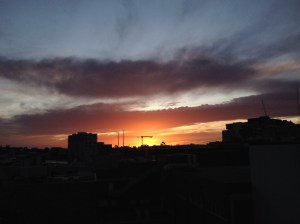 The sun sets over North Melbourne.